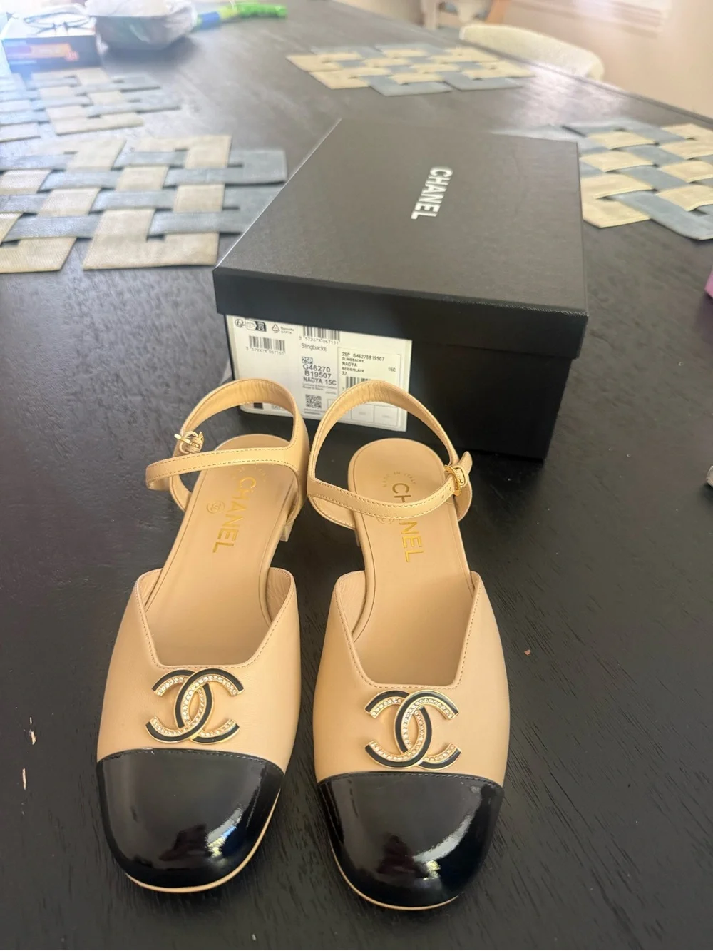 CHANEL Beige and Black Cap-Toe Logo Slingback Flats